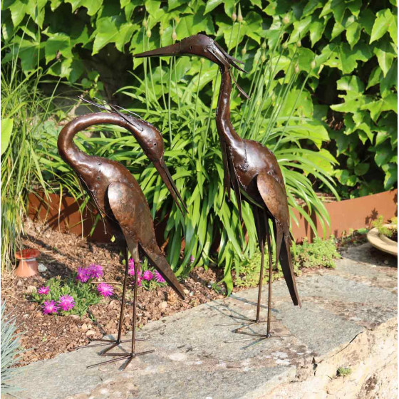 heronneau en metal au jardin